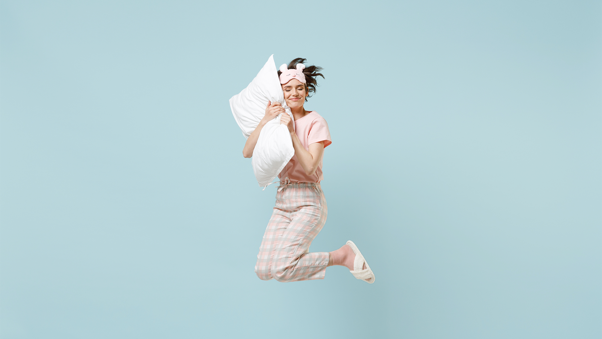 Woman jumping up after sleeping